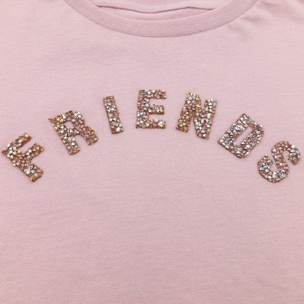 זוג חולצות בגזרה רחבה עם אפליקציות בנות